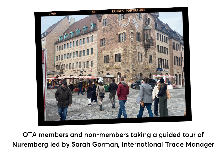 OTA members and non-members taking a guided tour of Nuremberg led by Sarah Gorman, International Trade Manager