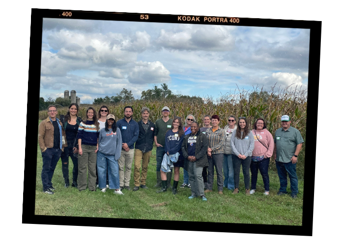 OTA staff in front of field